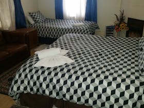 Two beds in a hotel room