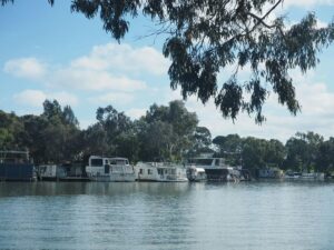 different kinds of boats on a river