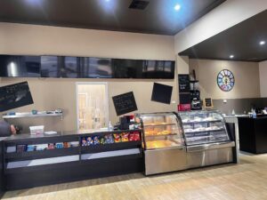 Counter with chips and snacks with two display having sandwiches