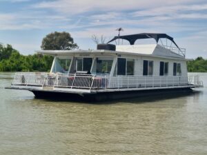 Houseboat named Breakaway on a river